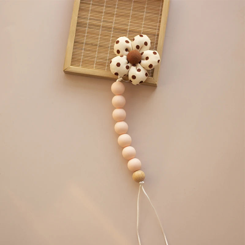 Clip para chupete Kalinatur™ de silicona con forma de flor – Mordedor natural