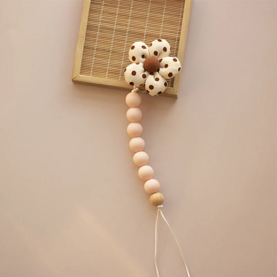 Clip para chupete Kalinatur™ de silicona con forma de flor – Mordedor natural