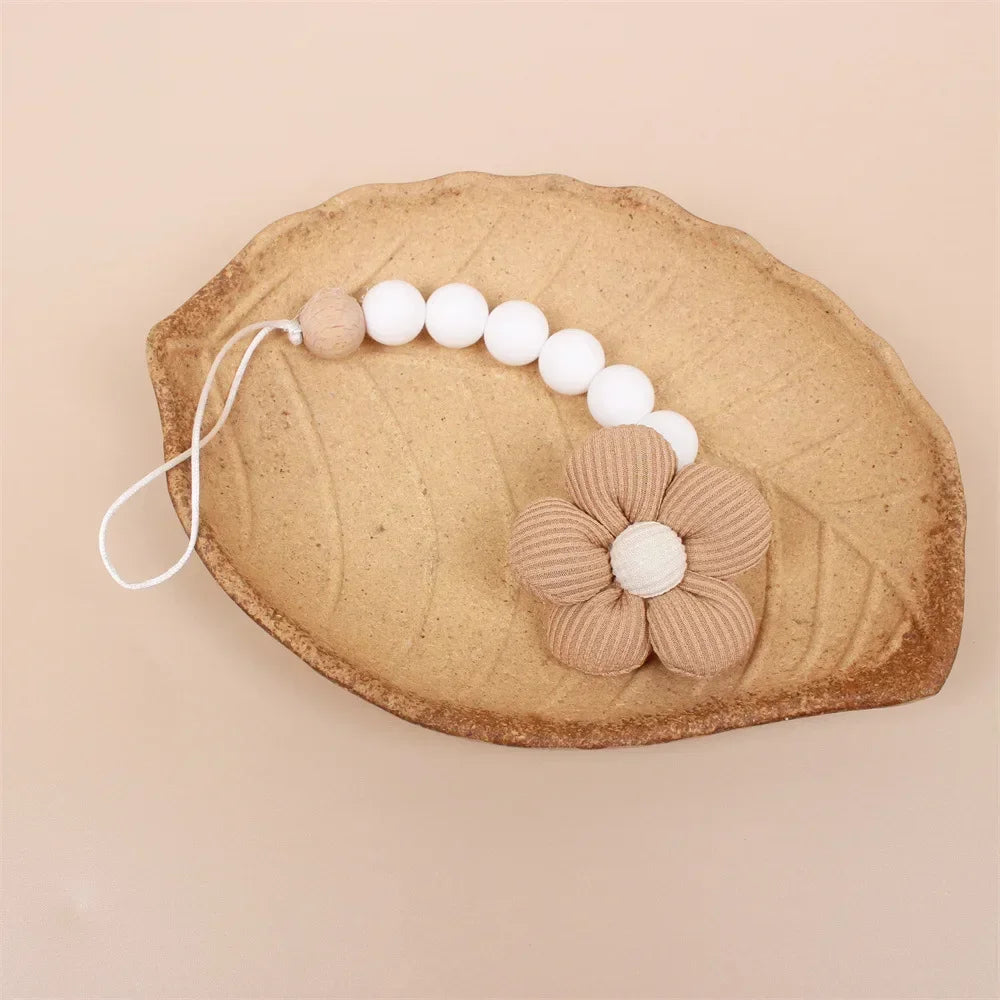 Clip para chupete Kalinatur™ de silicona con forma de flor – Mordedor natural