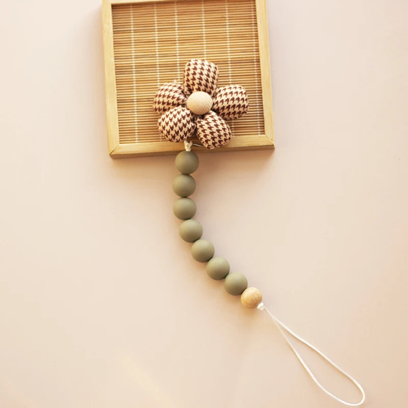 Clip para chupete Kalinatur™ de silicona con forma de flor – Mordedor natural