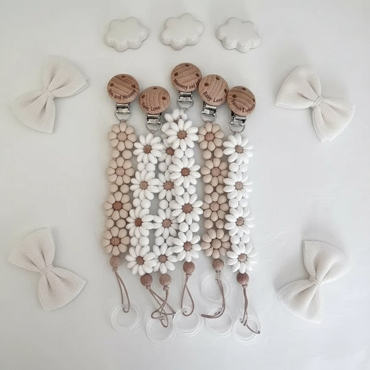 Attache-tétine fleur silicone Kalinatur™ – Douceur, sécurité & style bébé