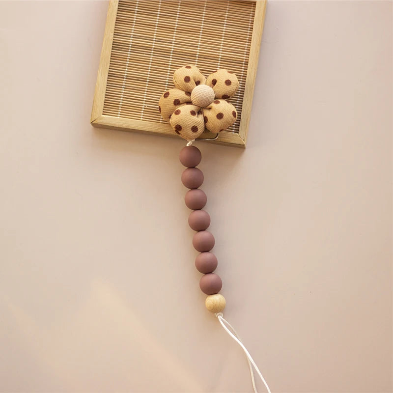 Clip para chupete Kalinatur™ de silicona con forma de flor – Mordedor natural