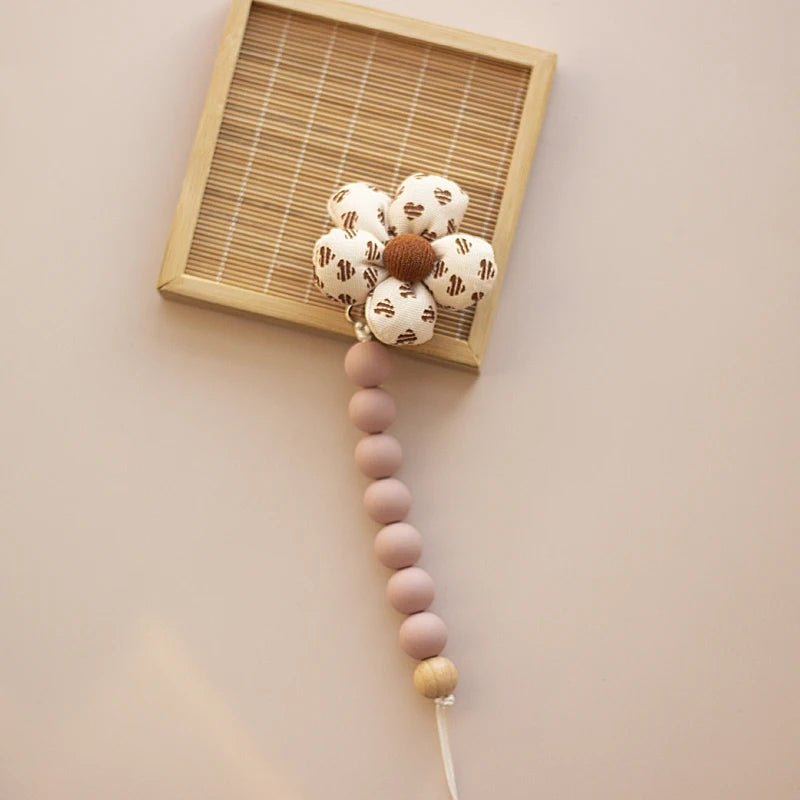 Attache-tétine fleur silicone Kalinatur™ – Anneau de dentition naturel