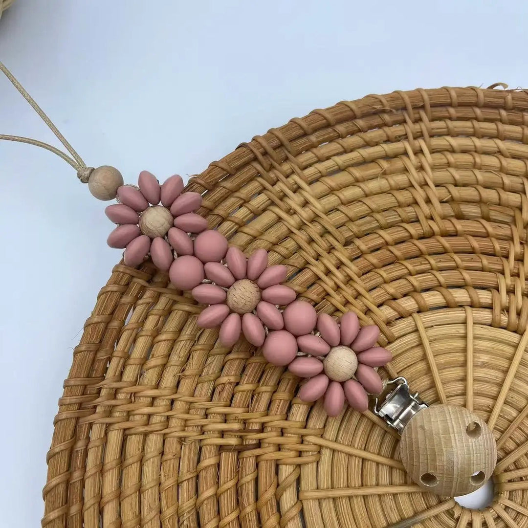 Attache-tétine fleur silicone Kalinatur™ – Douceur, sécurité & style bébé