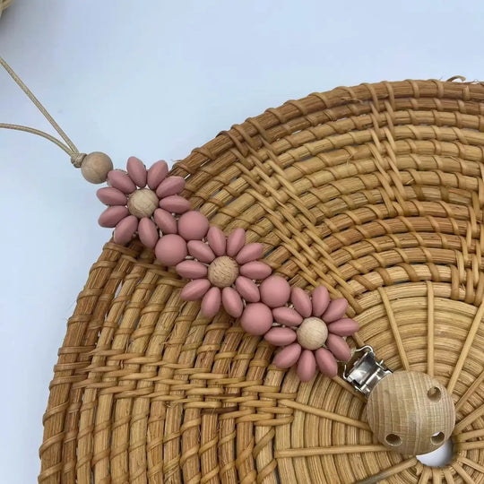 Attache-tétine fleur silicone Kalinatur™ – Douceur, sécurité & style bébé
