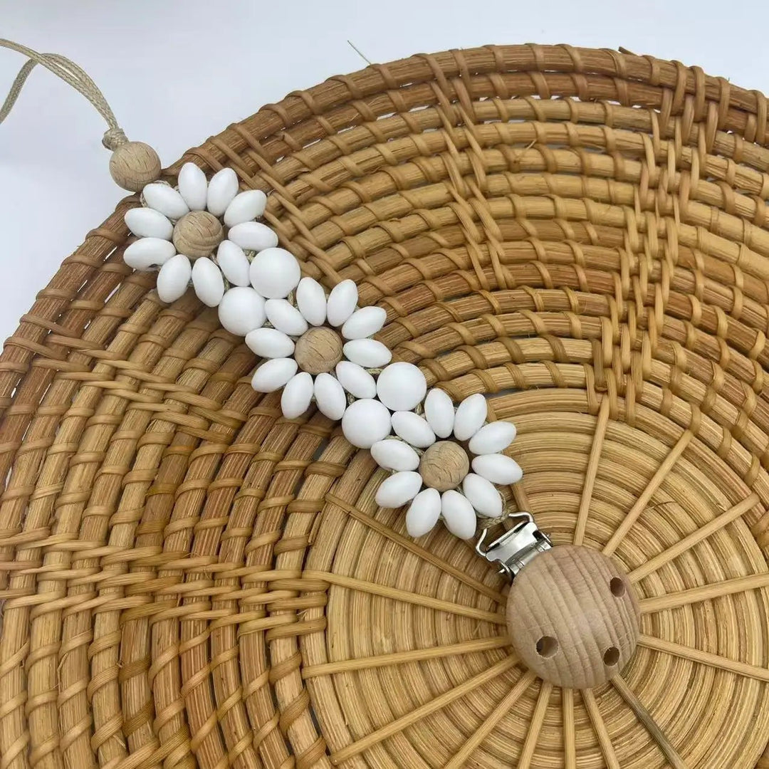 Attache-tétine fleur silicone Kalinatur™ – Douceur, sécurité & style bébé