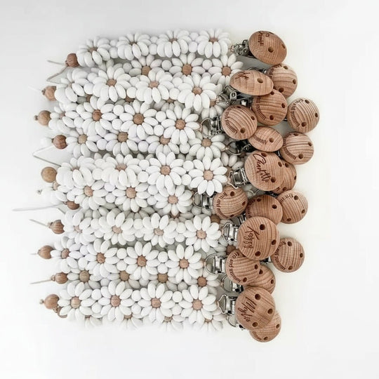 Attache-tétine fleur silicone Kalinatur™ – Douceur, sécurité & style bébé