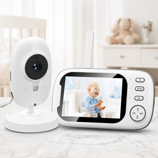 Babyphone vidéo HD avec caméra blanche et écran LCD couleur de 3,5 pouces affichant un bébé. Vision nocturne, audio bidirectionnel, détection de mouvement, surveillance de la température et portée jusqu&