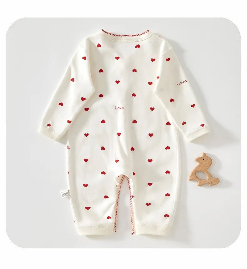 « Combinaison bébé blanche à cœurs rouges vue de face – Kalinatur »