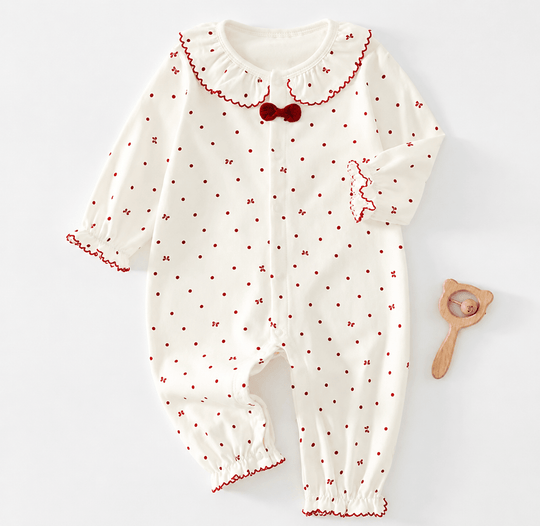 Barboteuse bébé fille blanche en coton doux à motif pois rouges 