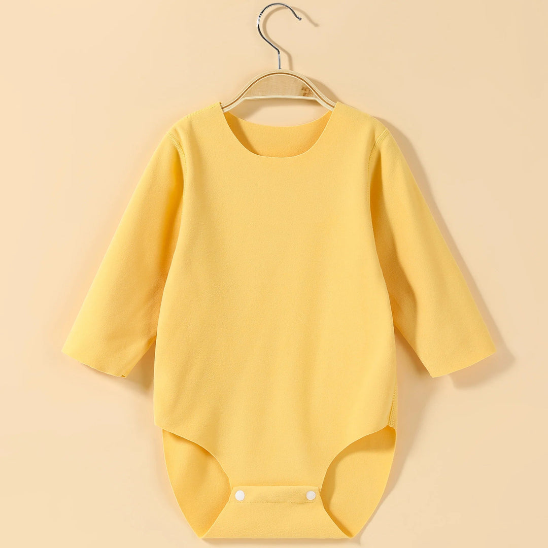 Body bébé jaune manches longues en coton doux avec fermeture pression à l’entrejambe, confortable pour enfant de 0 à 12 mois.