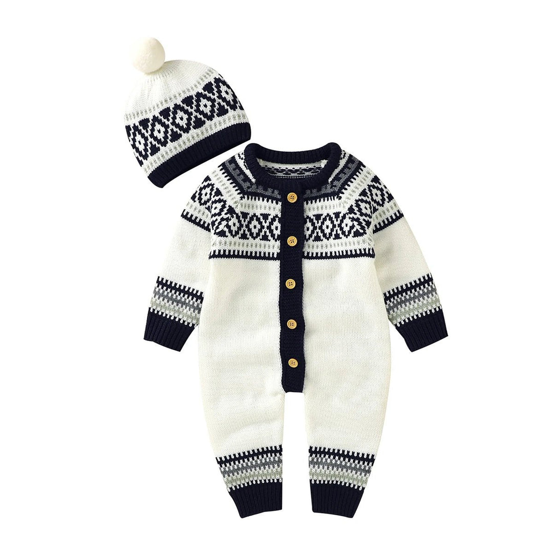 Combinaison d’hiver tricot blanche et bleu marine pour bebe avec boutons en bois et bonnet assorti a pompon, tenue chaude et chic KaliNatur.
