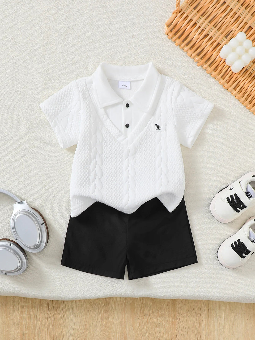 ensemble polo blanc et short noir bebe
