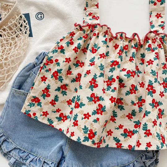 zoom ensemble  top fleuri et short bleu