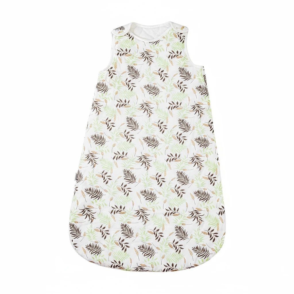 Gigoteuse bébé en coton doux motif feuillage vert et brun, signée Kalinatur — idéale pour les nuits d’hiver, chaleur et confort naturel assurés.

