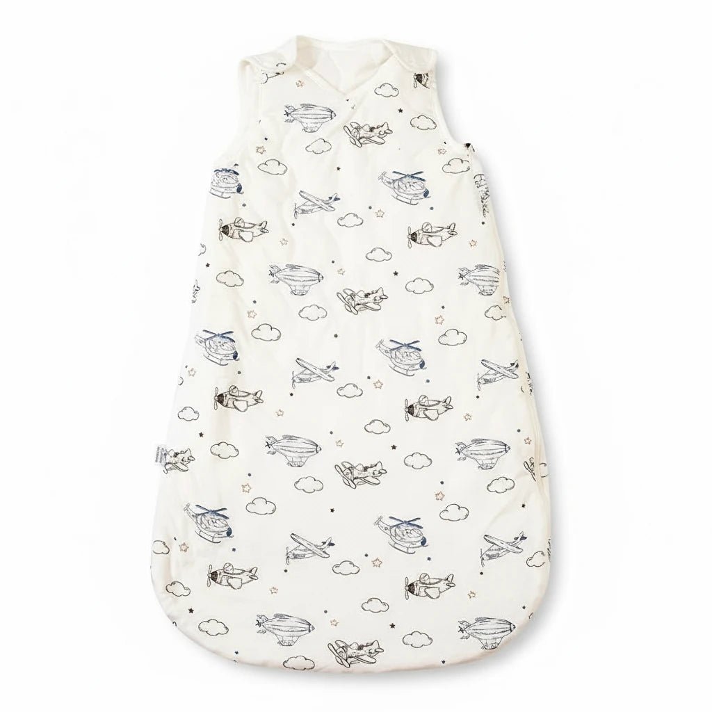 Gigoteuse bébé hiver en coton bio avec motifs montgolfières et avions – modèle Kalinatur, douce, respirante et chaude pour des nuits paisibles.