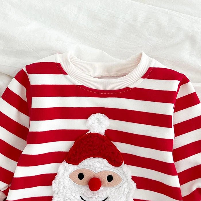 Body bébé Kalinatur à rayures rouges et blanches avec motif Père Noël en relief sur le devant.