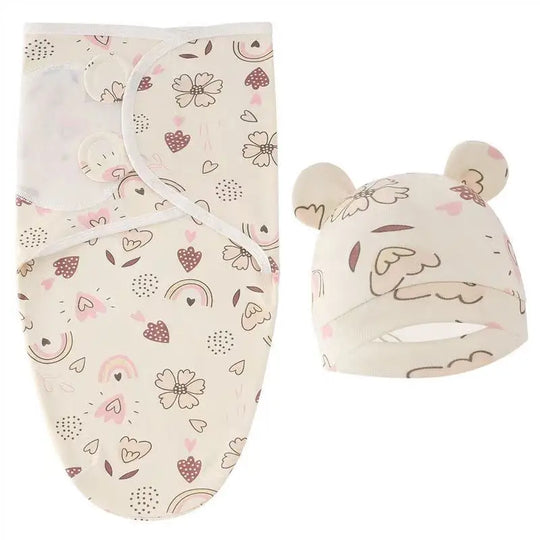 Couverture d’emmaillotage 100 % coton motif cœurs et arcs-en-ciel avec bonnet à petites oreilles.