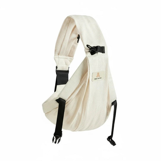 Porte-bébé sling ergonomique couleur crème Kalinatur, avec sangle ajustable et tissu respirant.