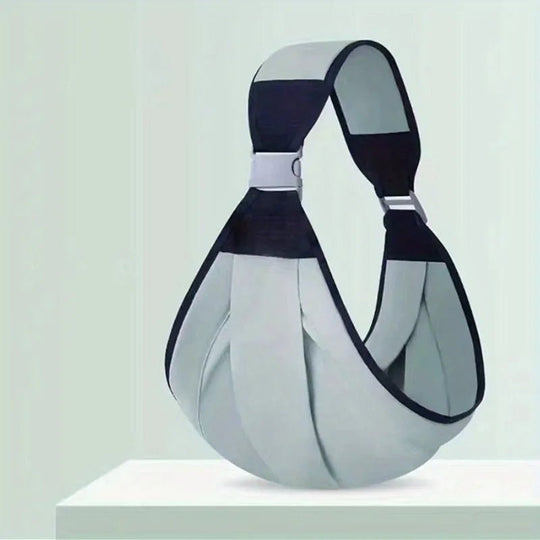 Porte-bébé sling vert Kalinatur en vue studio, tissu doux et design ergonomique.