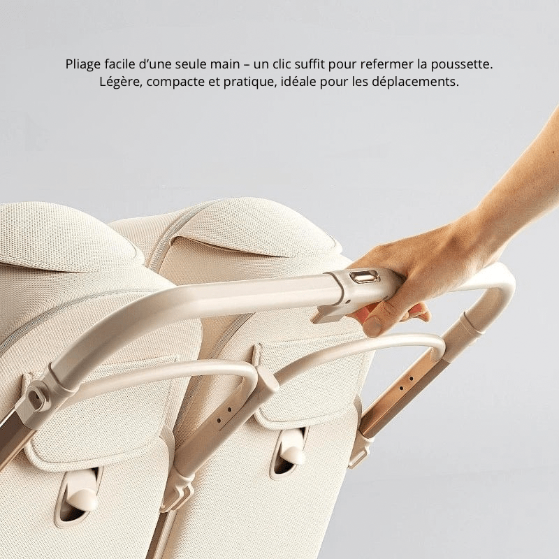 Système de pliage à une main de la poussette jumeaux beige Kalinatur, facile et rapide.