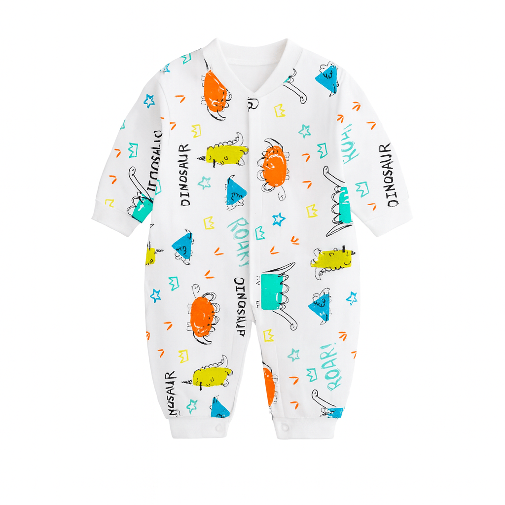 Pyjama bébé blanc imprimé dinosaures multicolores, étoiles et écritures ludiques.