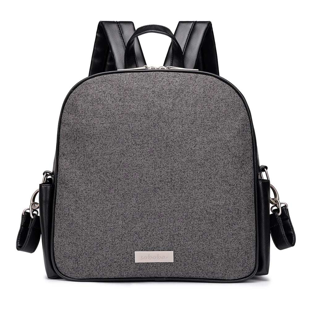 Sac à langer gris anthracite Kalinatur, tissu résistant et finitions noires.