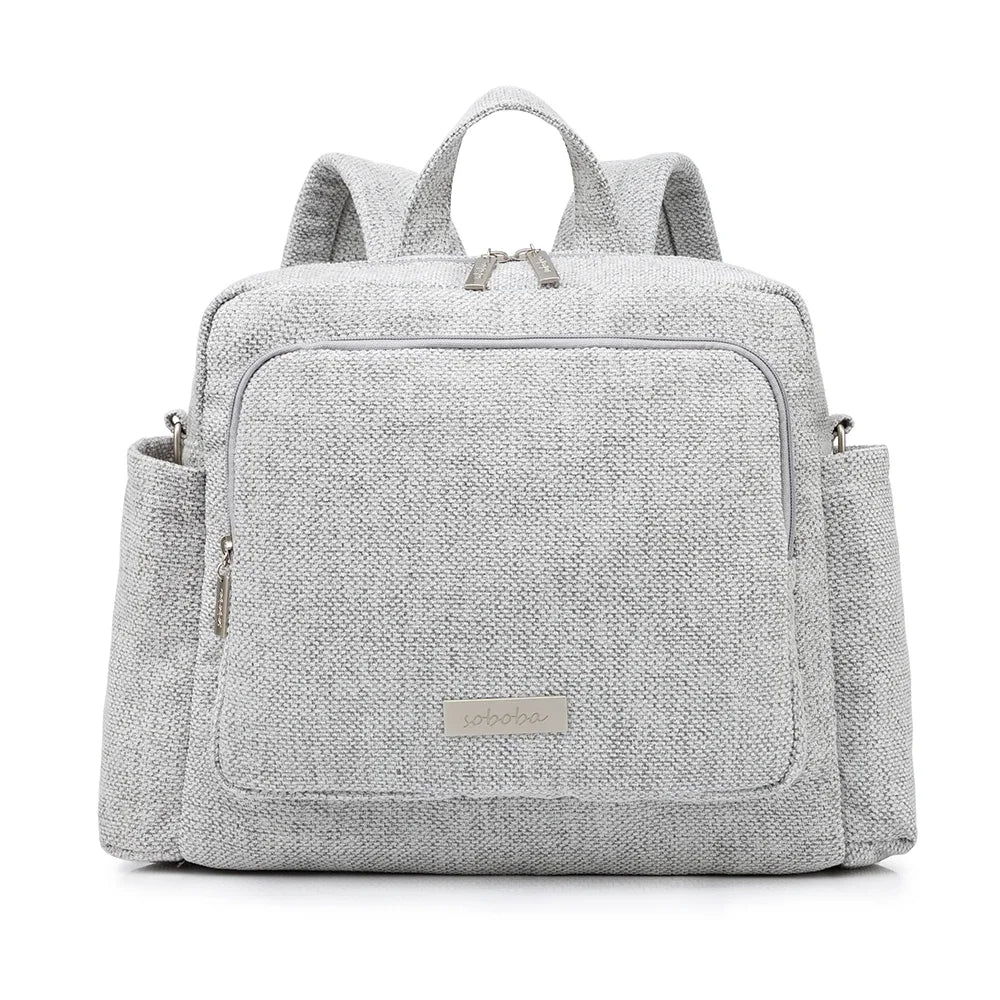 Sac à dos à langer gris clair Kalinatur, design moderne et imperméable.