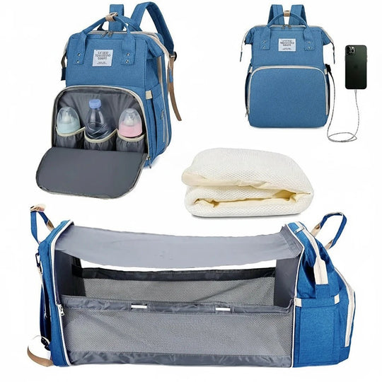 Sac à langer bleu avec compartiment isotherme, lit bébé pliable et matelas inclus