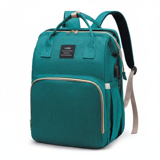 Sac à langer Kalinatur vert turquoise avec multiples rangements.