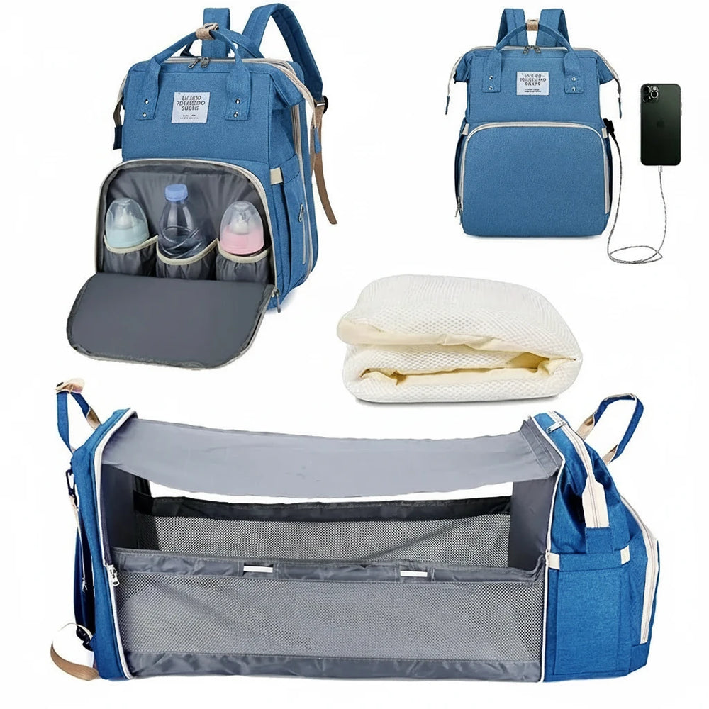 Sac à langer bleu avec compartiment isotherme, lit bébé pliable et matelas inclus