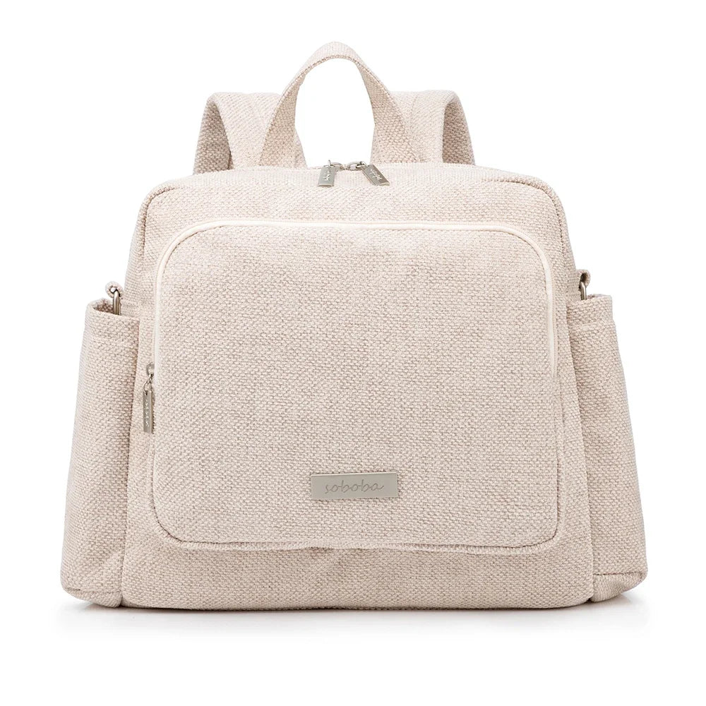 Sac à dos à langer beige lin Kalinatur, tissu texturé et poches pratiques.