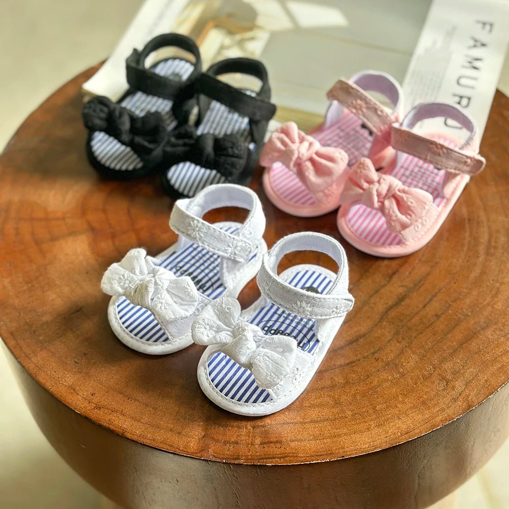 sandales bébé fille avec nœud semelle souple antidérapante premiers pas rose blanc noir
