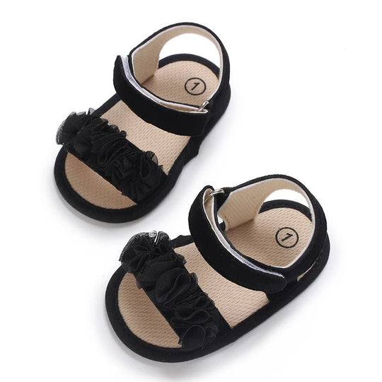 Sandales bébé fille noires avec fleurs en tissu et fermeture scratch, chaussures premiers pas à semelle souple antidérapante pour bébé de 0 à 18 mois
