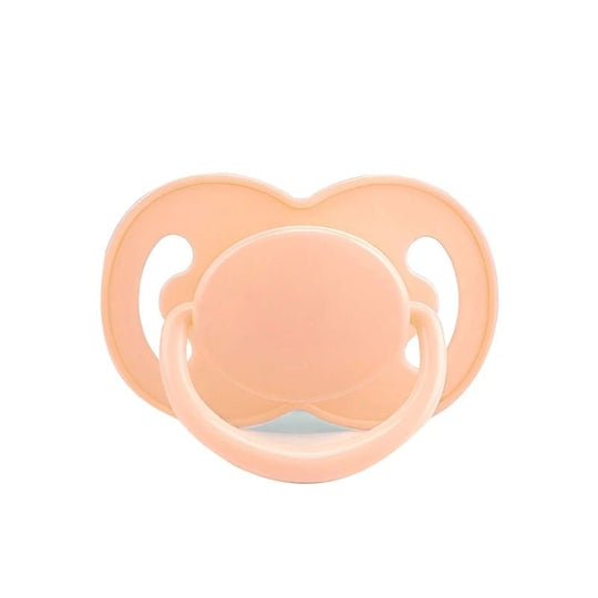 Tétine anatomique en silicone beige unie sur fond blanc – Kalinatur.