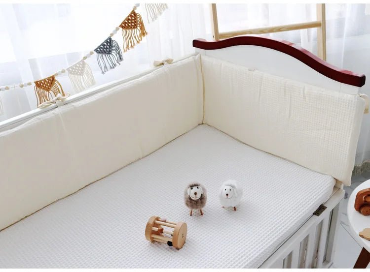 Protector de cuna de algodón, transpirable y lavable