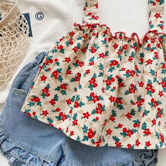 zoom ensemble  top fleuri et short bleu